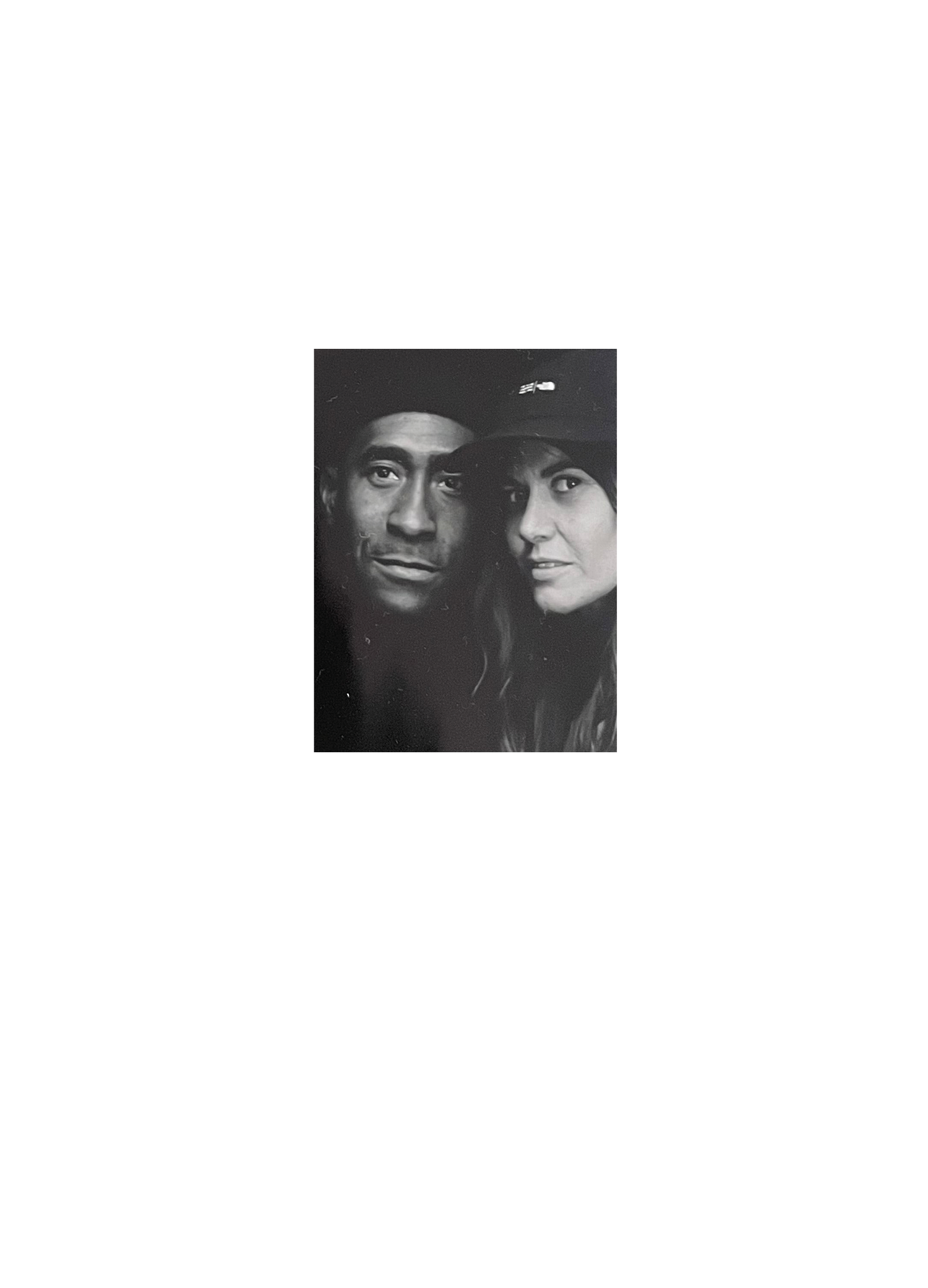 Black and white portrait of a man and woman on a white background